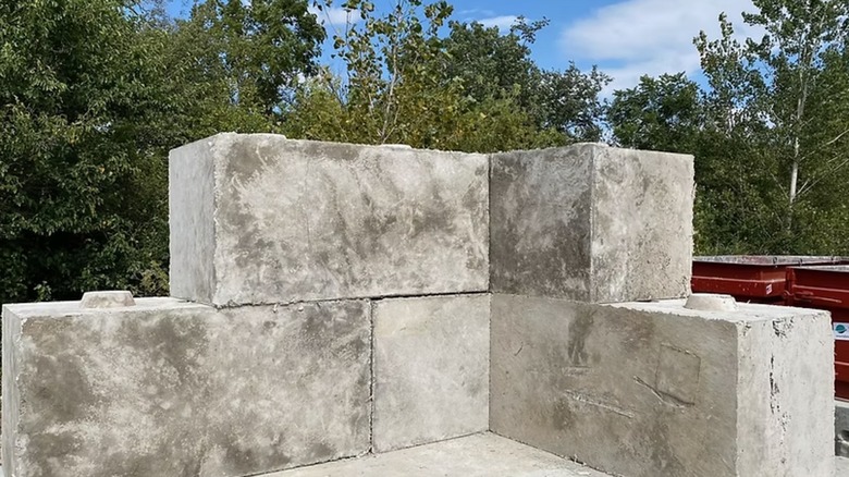 Several concrete blocks made from recycled wind turbine blades.