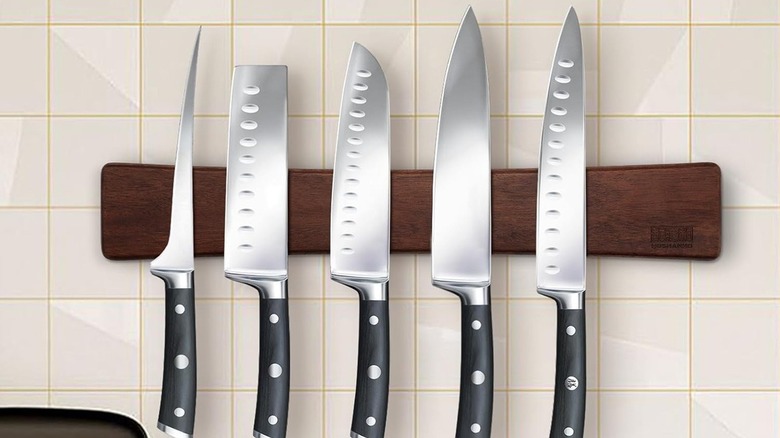 Knives on magnetic knife holder