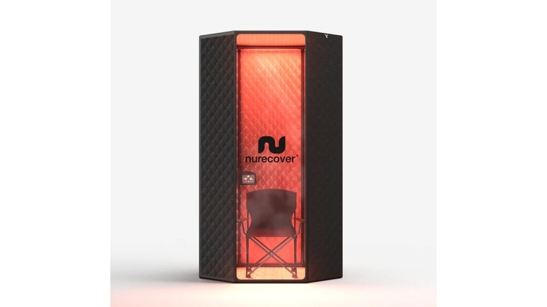 A portable steam sauna stall with Nurecover branding against a black background