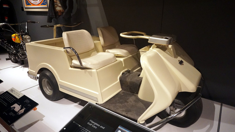 Three-wheeled Harley-Davidson golf cart on display at the Harley-Davidson Museum.