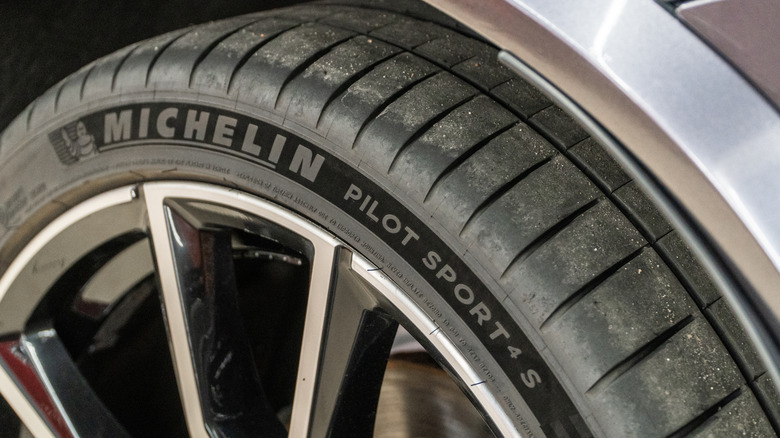 Close-up of Michelin Pilot Sport 4S tires showing logo on sidewall