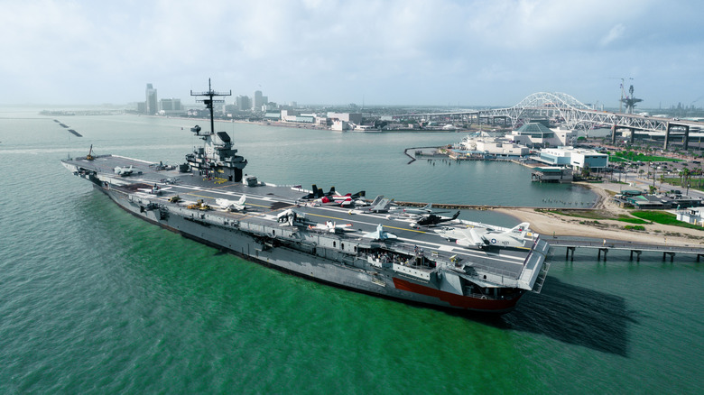 USS Lexington docked at pier Aerial View