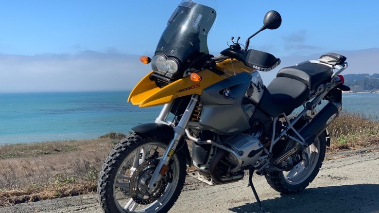 2005 BMW R1200GS parked on seaside road