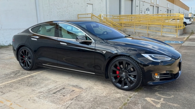 A black 2020 Tesla Model S Performance parked
