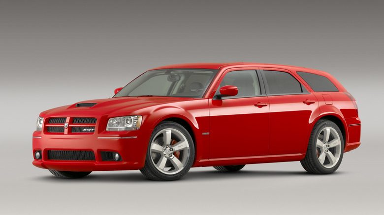 Front 3/4 of red 2008 Dodge Magnum SRT8 in studio.