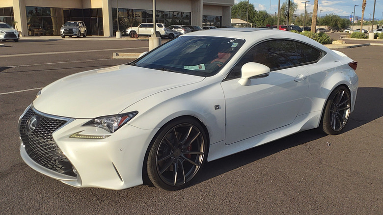 White Lexus RC 350 parked in a tarmac lot