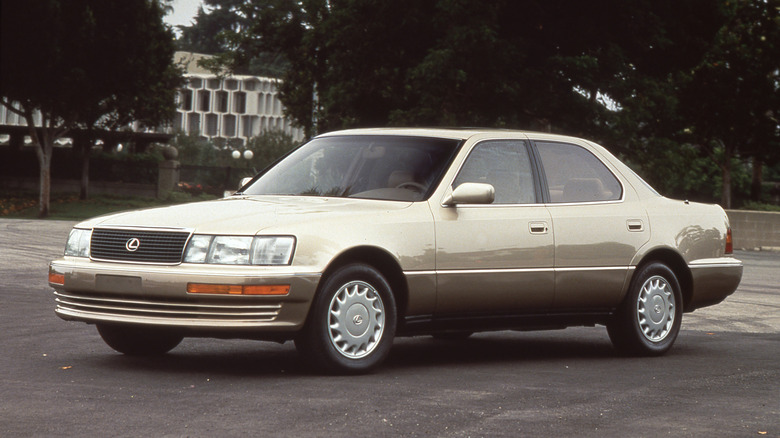 Front 3/4 view of a gold first generation Lexus LS400