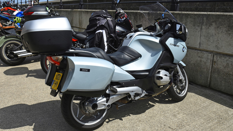 BMW K1200LT parked next to other bikes.