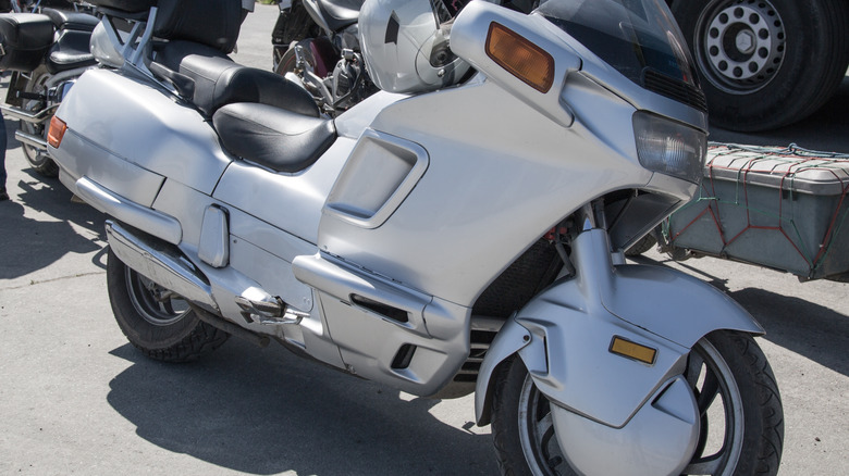 White Honda Pacific Coast with a lot of plastic body panels.