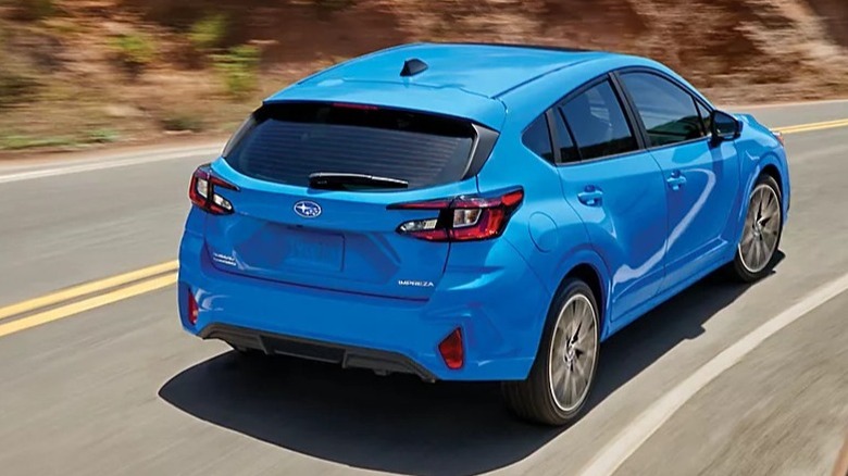 Rear view of a blue Subaru Impreza