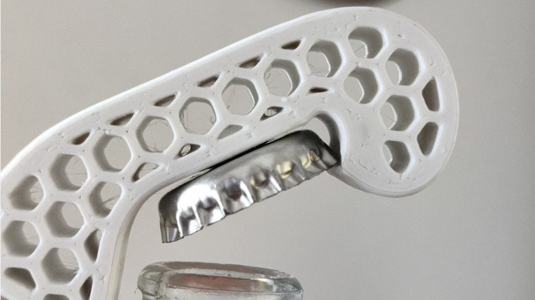 one-handed bottle opener