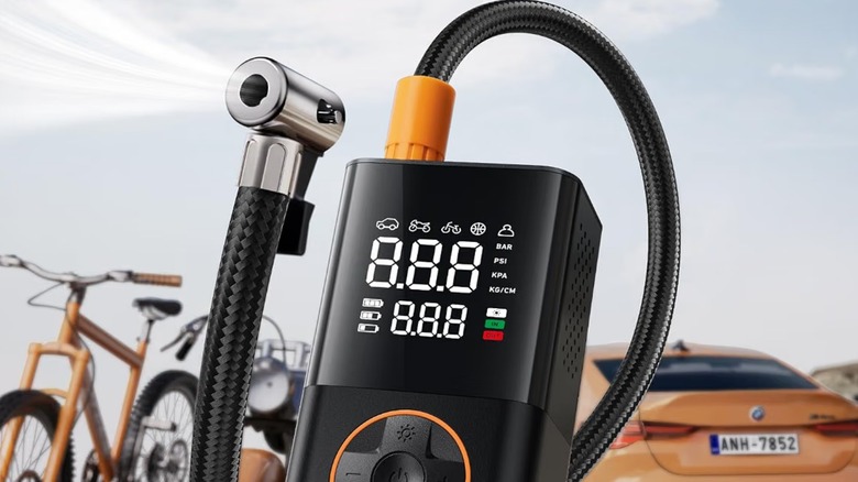Tire inflator in front of vehicles
