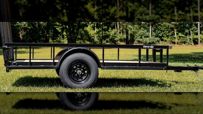 Two-wheel trailer attached to a vehicle.