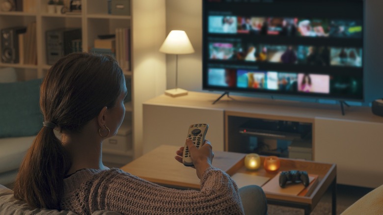 Woman using a smart TV