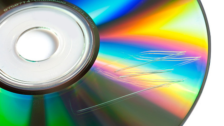 Close-up of a CD data surface with a big scratch on it