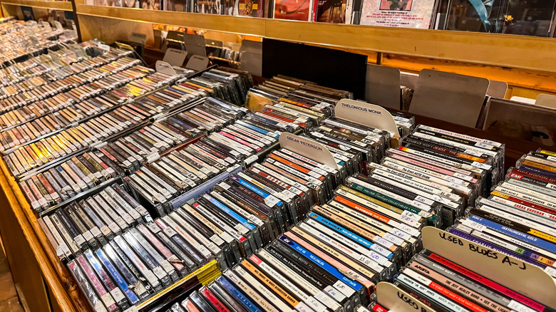 Full CD racks at a record store