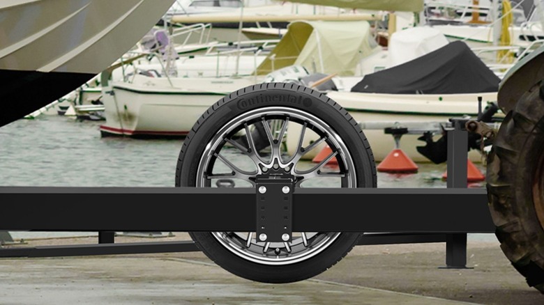 Gadfish spare tire carrier on boat trailer