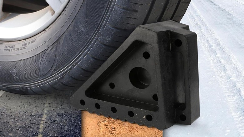MaxxHaul rubber wheel chock under a tire