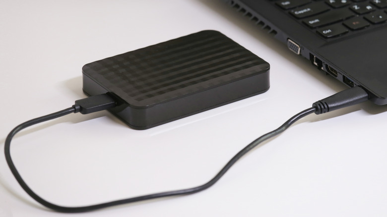 External hard drive connected to laptop