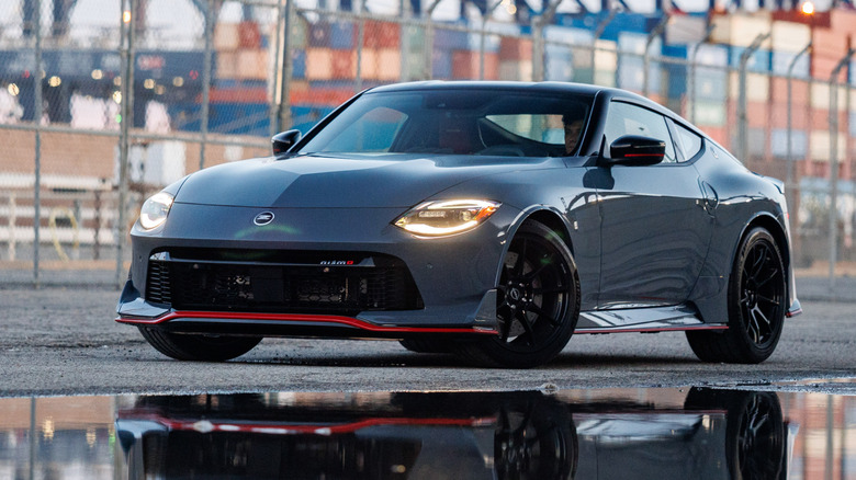 Front 3/4 of gray Nissan Z Nismo parked at harbor.