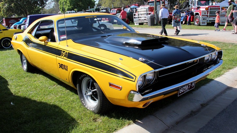 1970 Dodge Challenger T/A parked on grass at a car show.