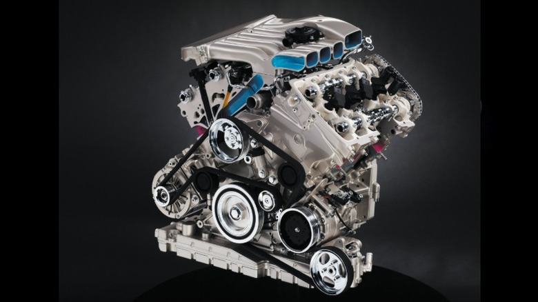 A Volkswagen W8 engine on display against a black background.