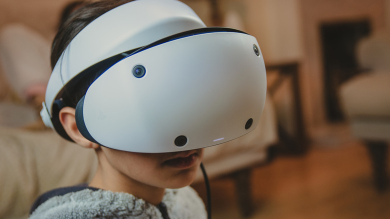 child wearing playstation vr2