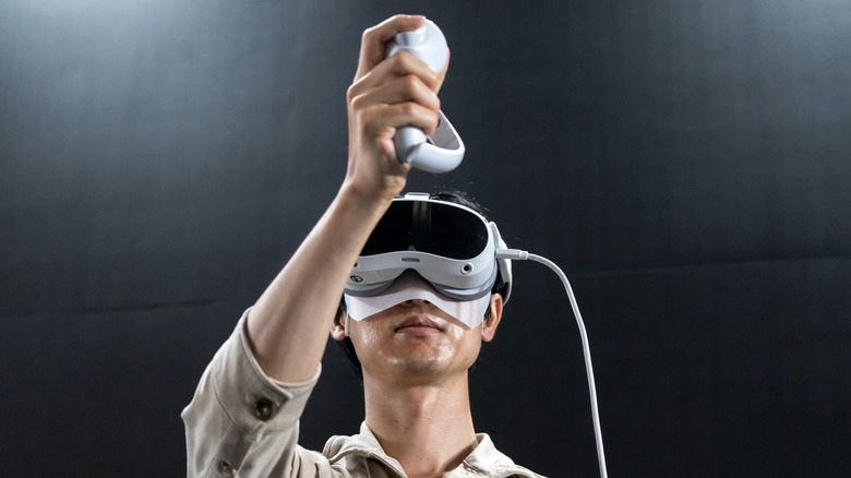 man using pico 4 VR headset