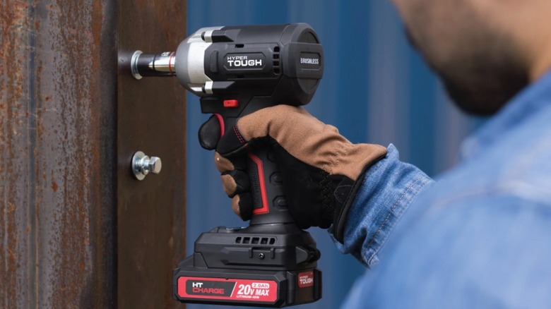 Hyper Tough 20V Max Compact 1/2-inch Impact Wrench in use
