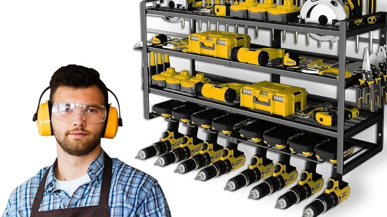 Man next to Catgood Power Tool Organizer on brick wall with white background