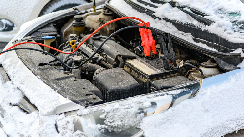Car in snowy conditions with discharged car battery