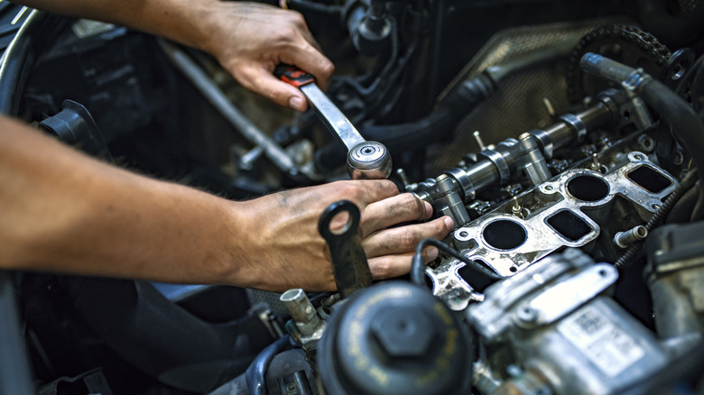 mechanic working on car