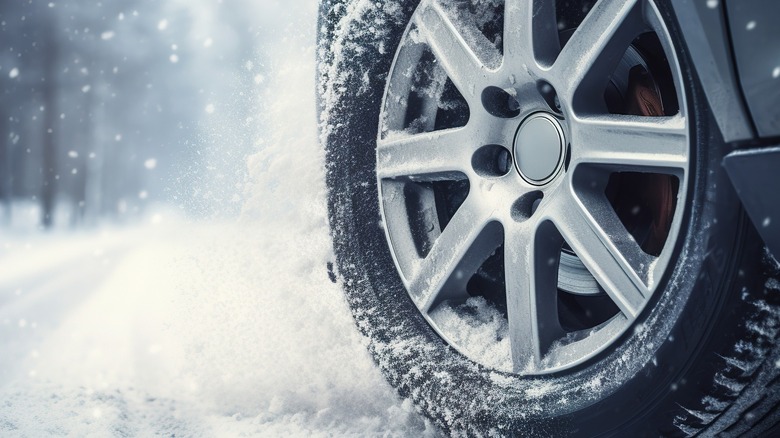 Car tire on snow