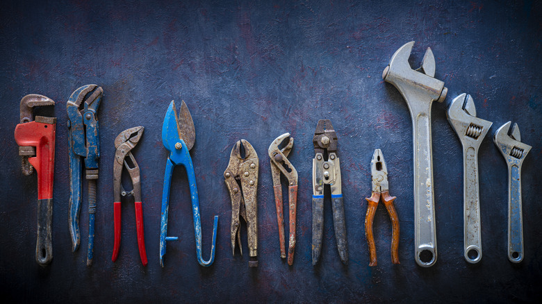 Tools laid out from rusty to clean