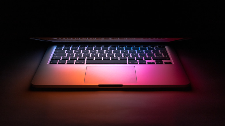 MacBook computer with colorful lighting
