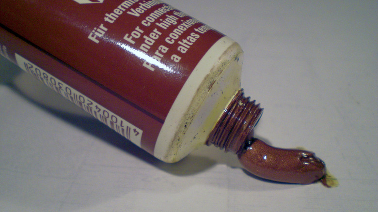 A tube of copper grease with some coming out