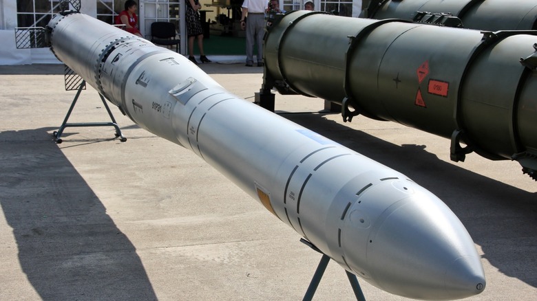 A 91RE1 submarine launched anti-submarine missile on display beside other munitions