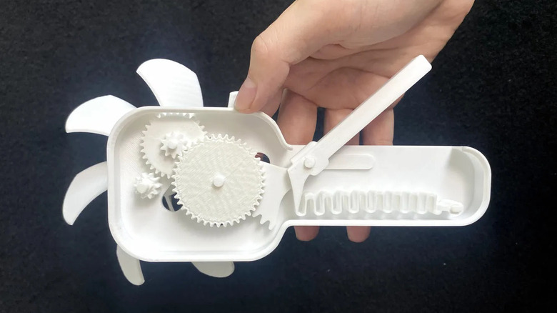 Manual fan cross-section held in a hand