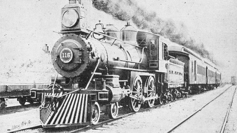 Black and white picture of a locomotive on the rail