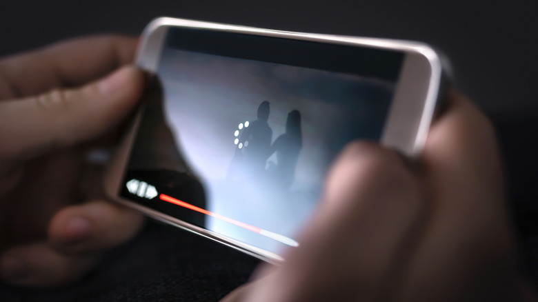 A phone buffering and during video playback, slowing it down