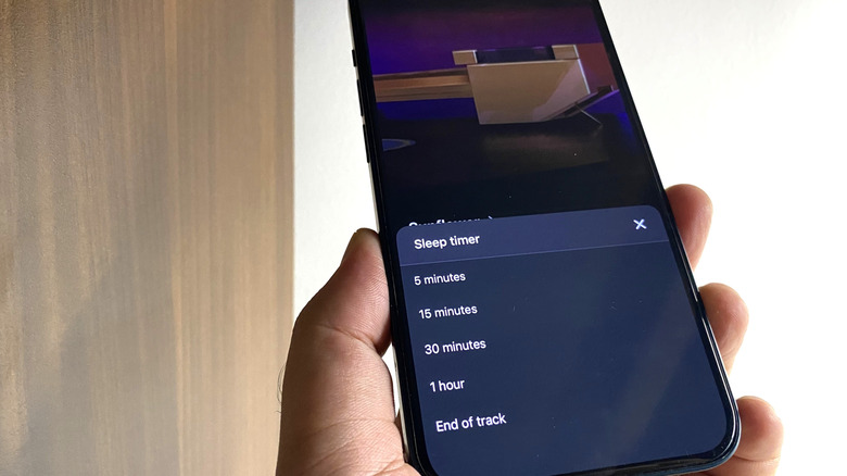 Setting sleep timer on a track on YouTube Music on a smartphone