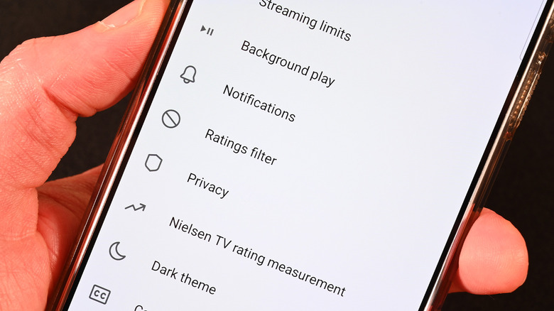 YouTube TV settings menu on phone, showing many options.