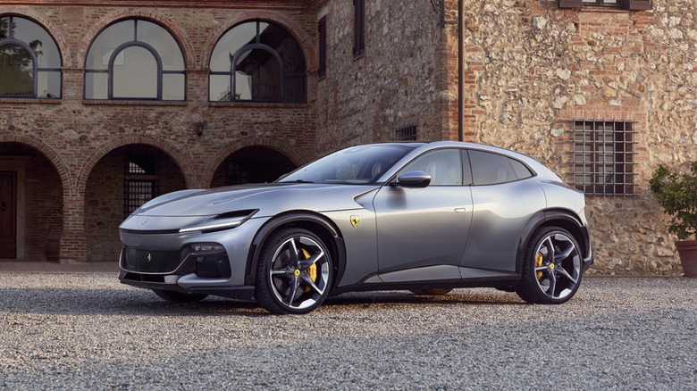 Ferrari Purosangue parked on a gravel driveway