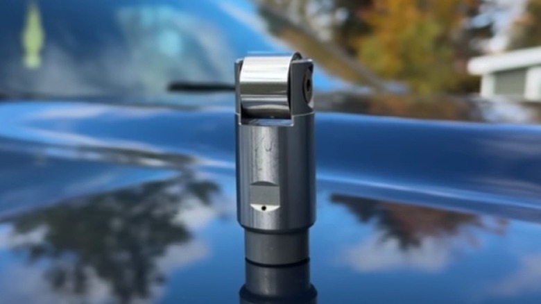 A 6.7 Cummins hydraulic roller lifter shown on the hood of a Ram truck.