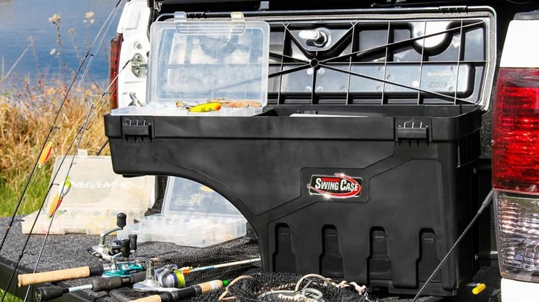 A SwingCase wheel well toolbox full of fishing equipment