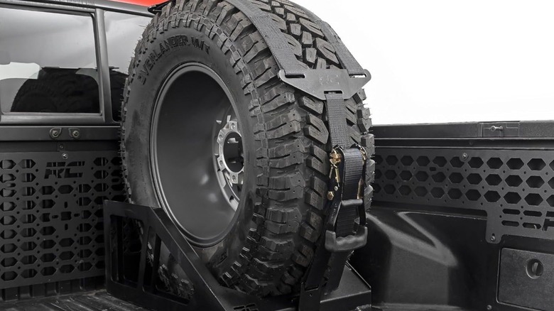 A vertical spare tire carrier by Rough Country