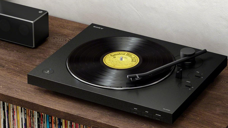 Sony PS-LX310BT on a shelf next to a soundbar.