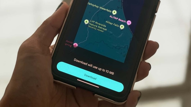 Google Maps' download offline map page is seen on a mobile phone screen