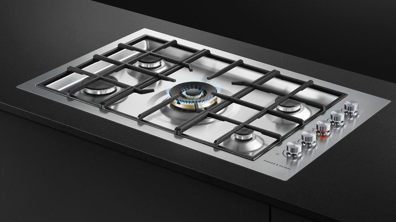 Fisher & Paykel cooktop integrated into a black countertop