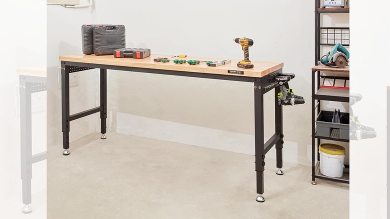 the Vevor height-adjustable work bench with tools placed on it